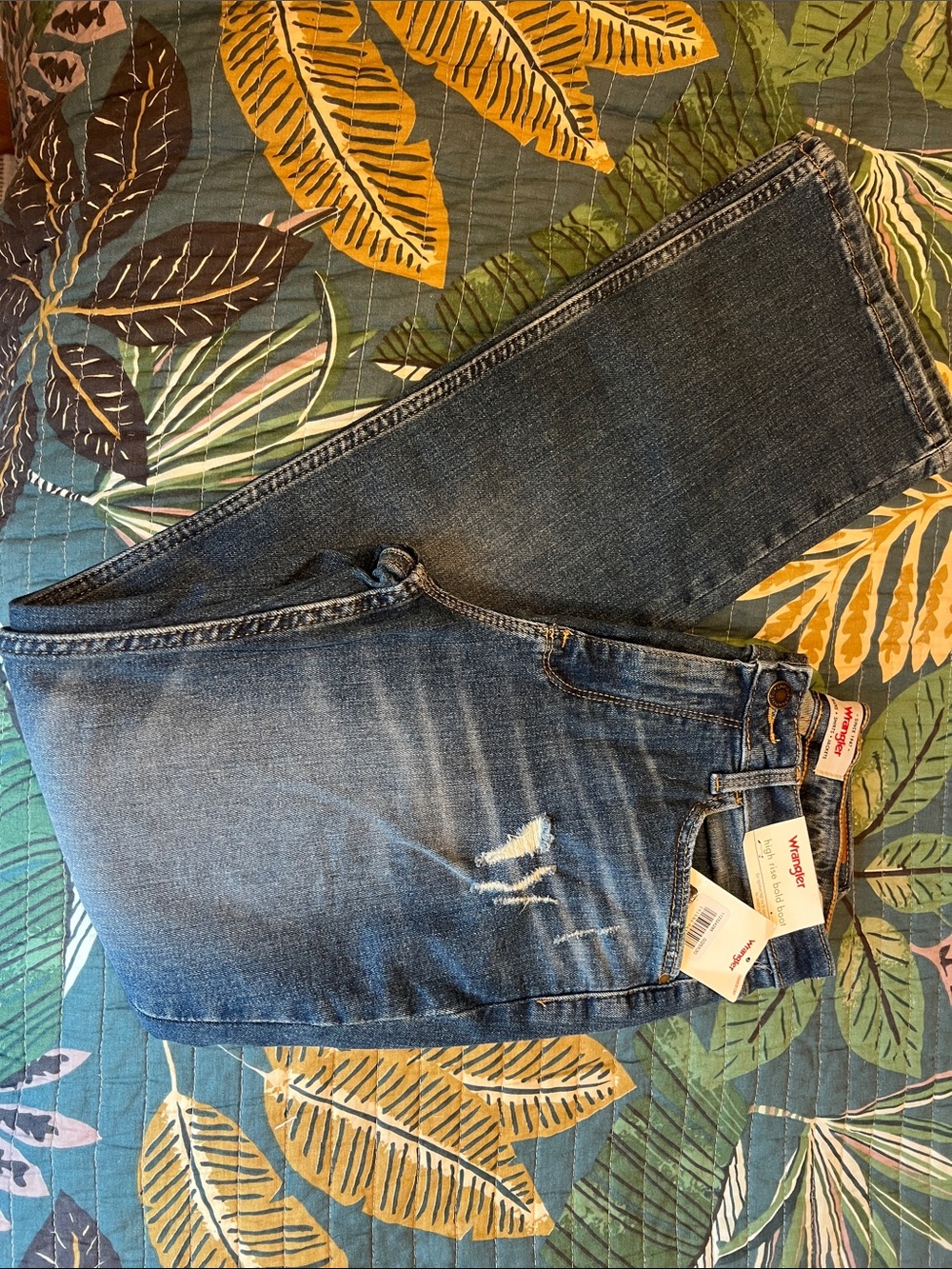 Wrangler Medium Blue Denim Straight-Leg Jeans with Light Distress